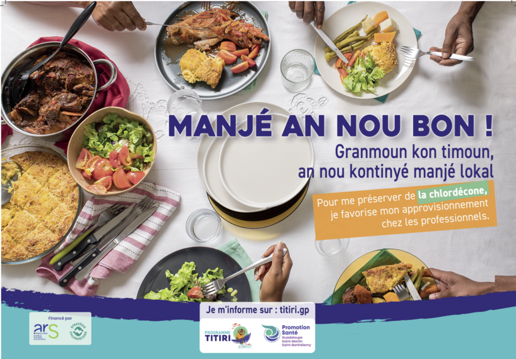 Table dressée avec plats antillais et message de prévention : "Pour me préserver de la chlordécone, je favorise mon approvisionnement chez les professionnels." - Agrandir l'image, fenêtre modale
